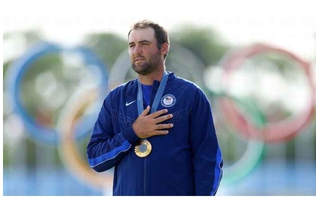 Scottie Scheffler shoots a final-round 62 to win gold at the Olympics.